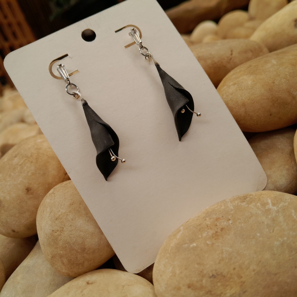 Polymer clay black Lilly's with cubic zirconia studs