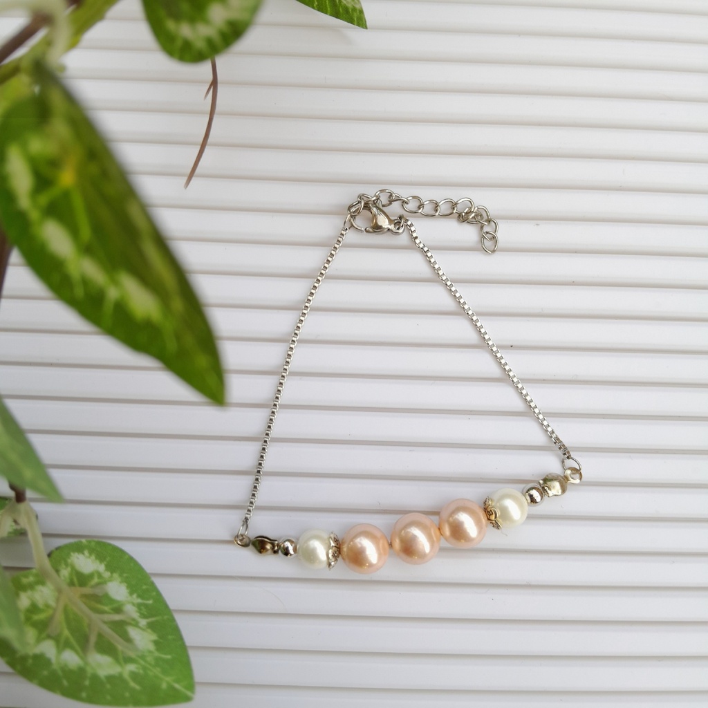 Stainless Steel Slider bracelet made with Mother of Pearl Beads