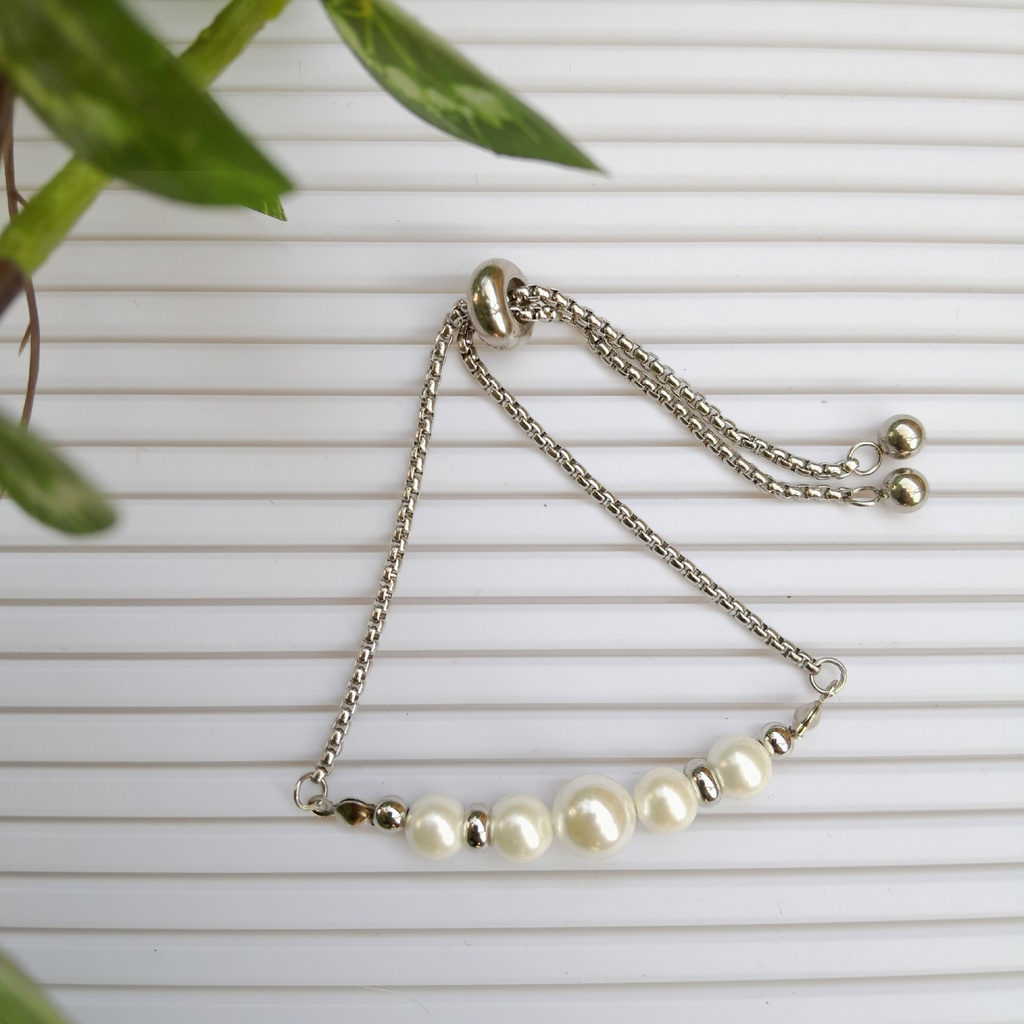 Stainless Steel Slider bracelet made with Mother of Pearl beads