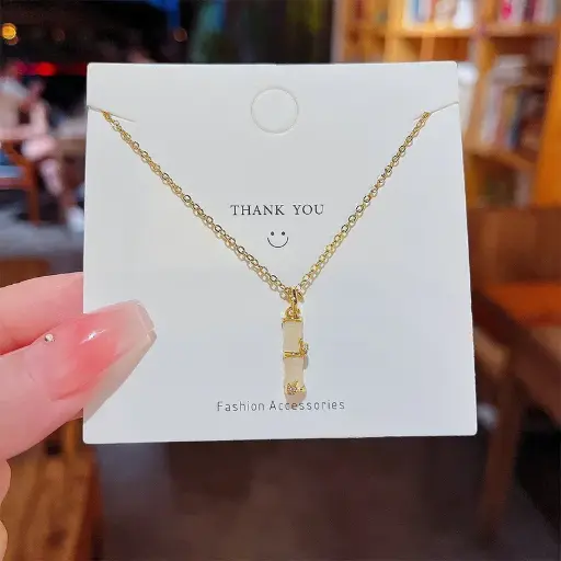 [neck192] Stainless Steel necklace with Bamboo pendant with cats eye stones